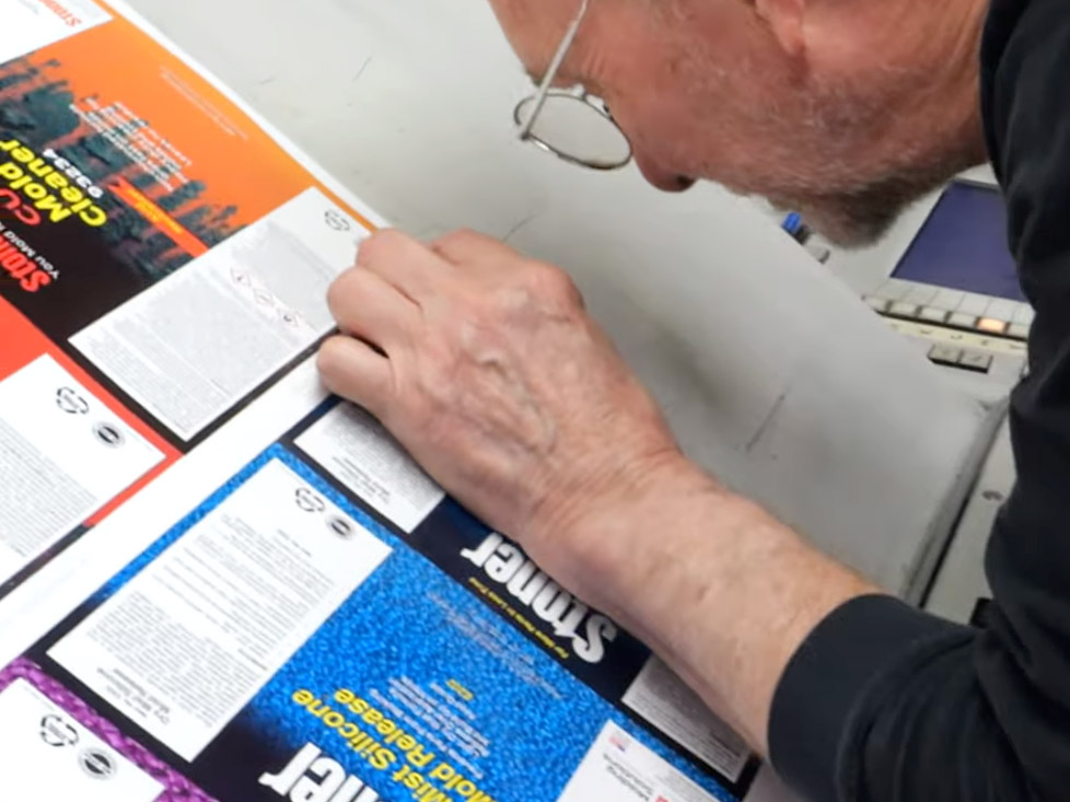 Printer examining print quality of aerosol labels